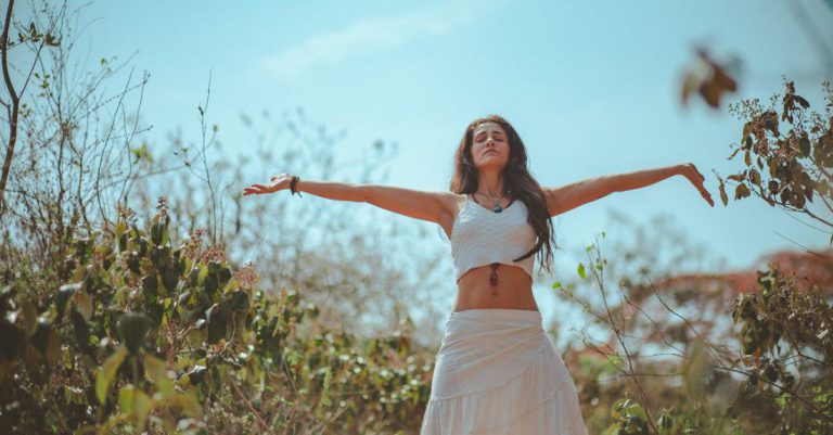 Yoga Styles - Woman Spreading Both Her Arms