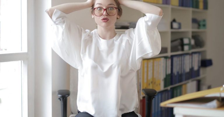 Yoga Stress - Shocked female worker in modern workplace