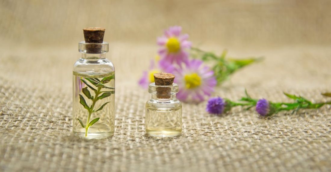 Aromatherapy - Two Clear Glass Bottles With Liquids